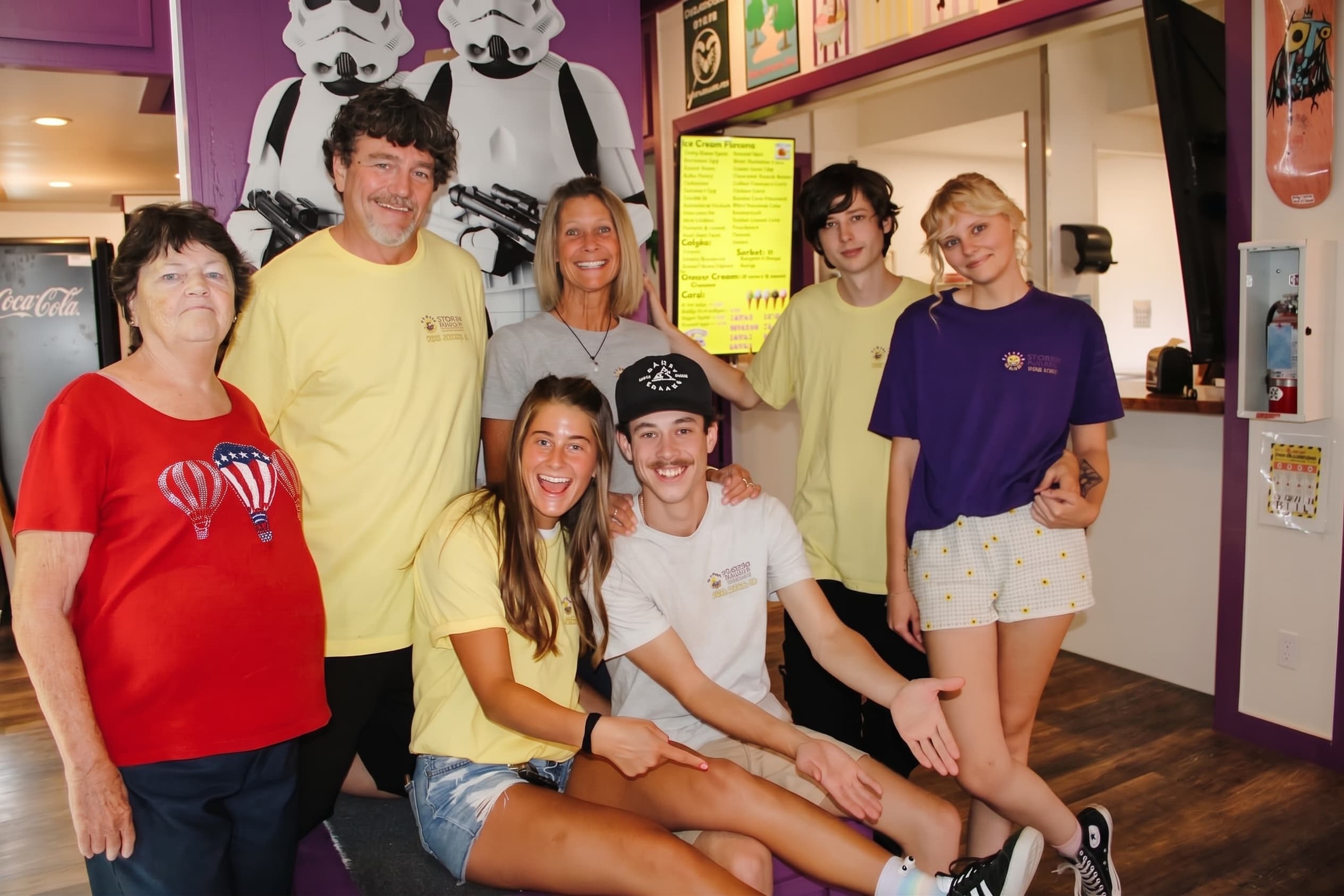 The whole family gathered inside the parlor with the Stormtrooper standee