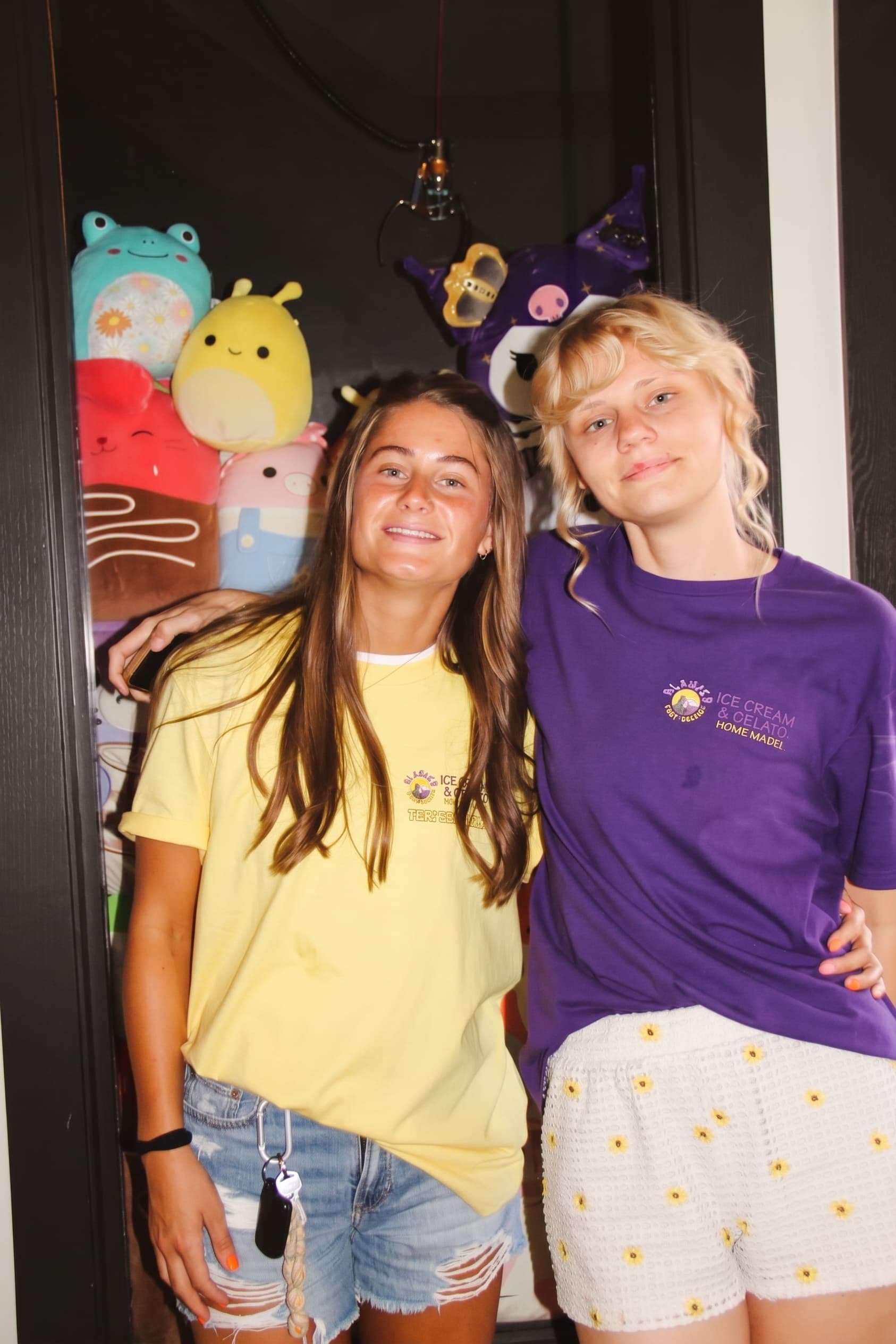 Crew members by the Squishmallow window display