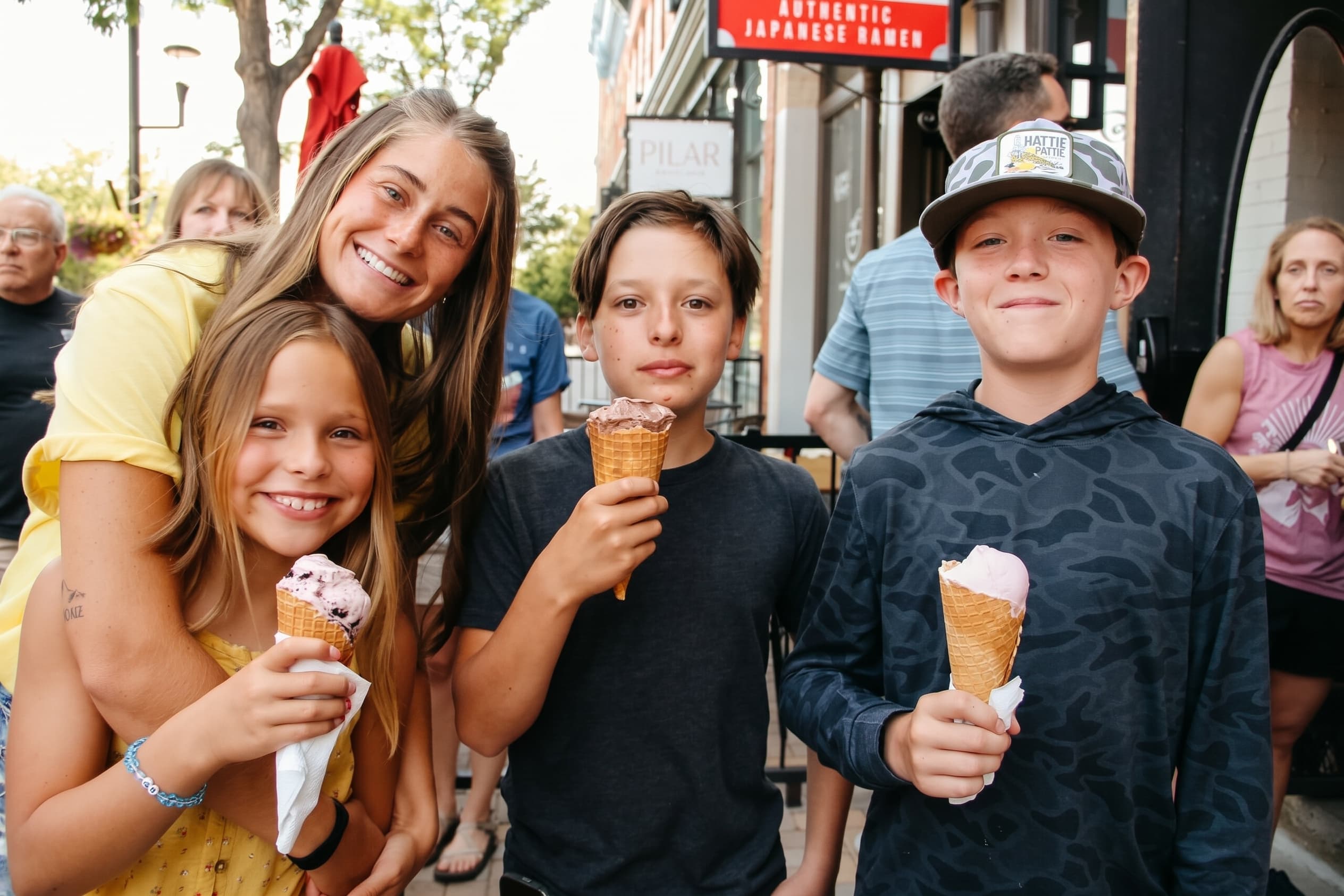 Kids showing off their first cones from the new shop