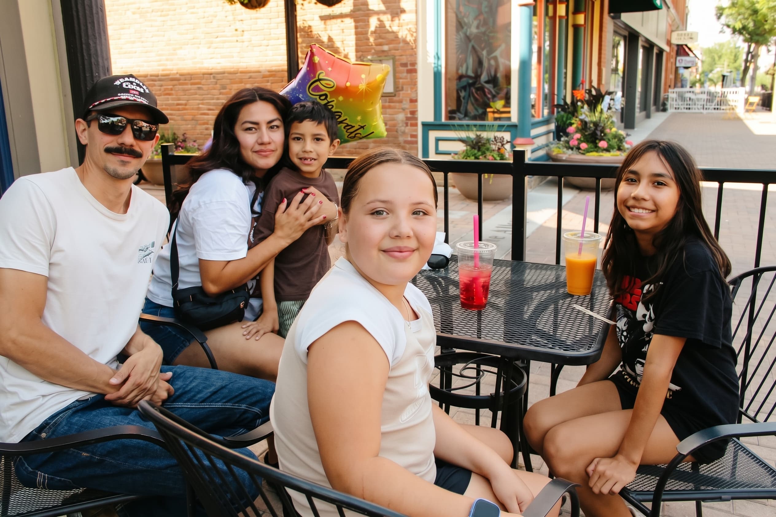 Guests relaxing at the patio tables