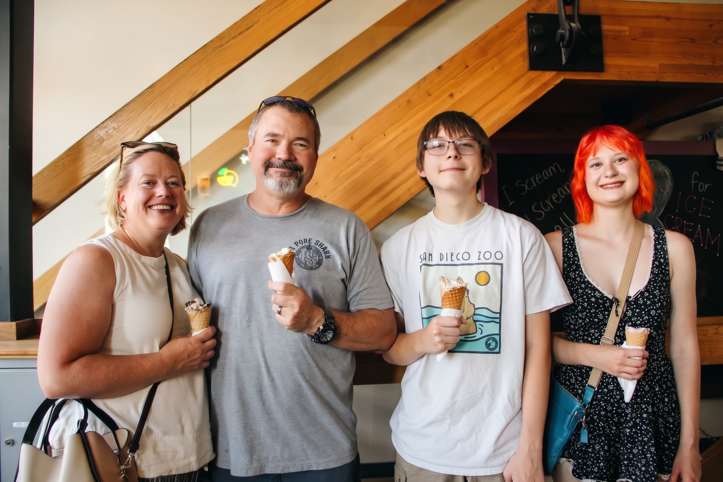 A family posing inside the new parlor