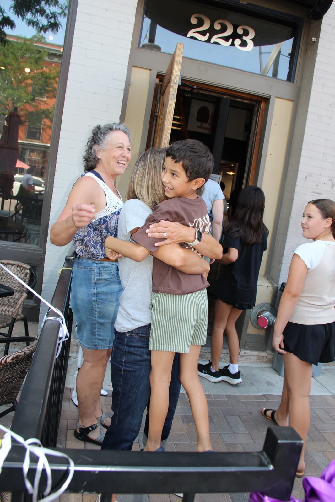 Hugs at the front door as guests arrive