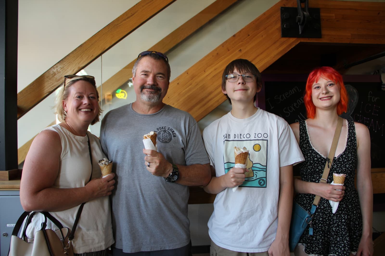 A family posing inside the new parlor
